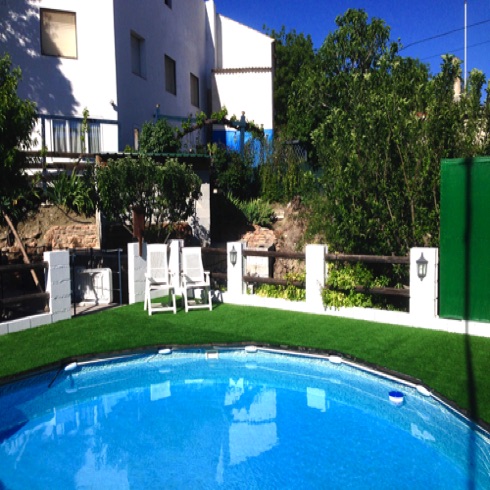 Pool taken towards house